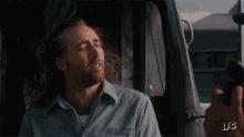 nicolas-cage-w-ind-in-the-hair.gif.a3823f1478dad8b1c7248201405d00f9.gif
